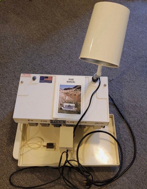 Pixie Gem Maker (portable lapidary machine) by Diamond Pacific Tool
Corporation.